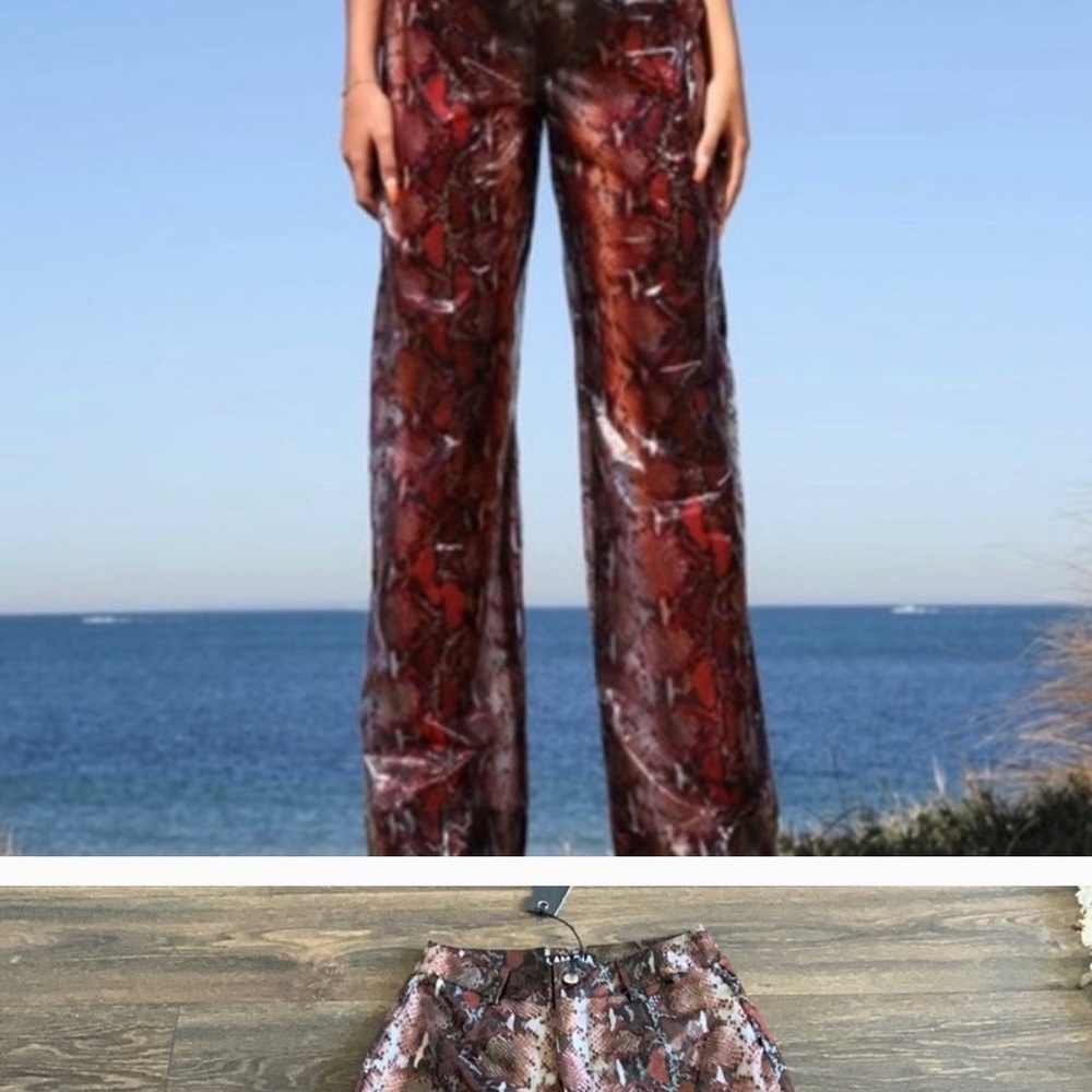 I.AM.GIA. See through snake print pants .